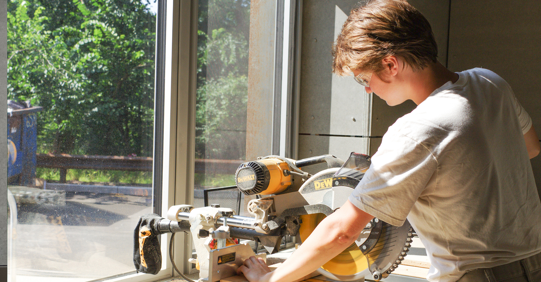 Photo of worker using electrical equipment